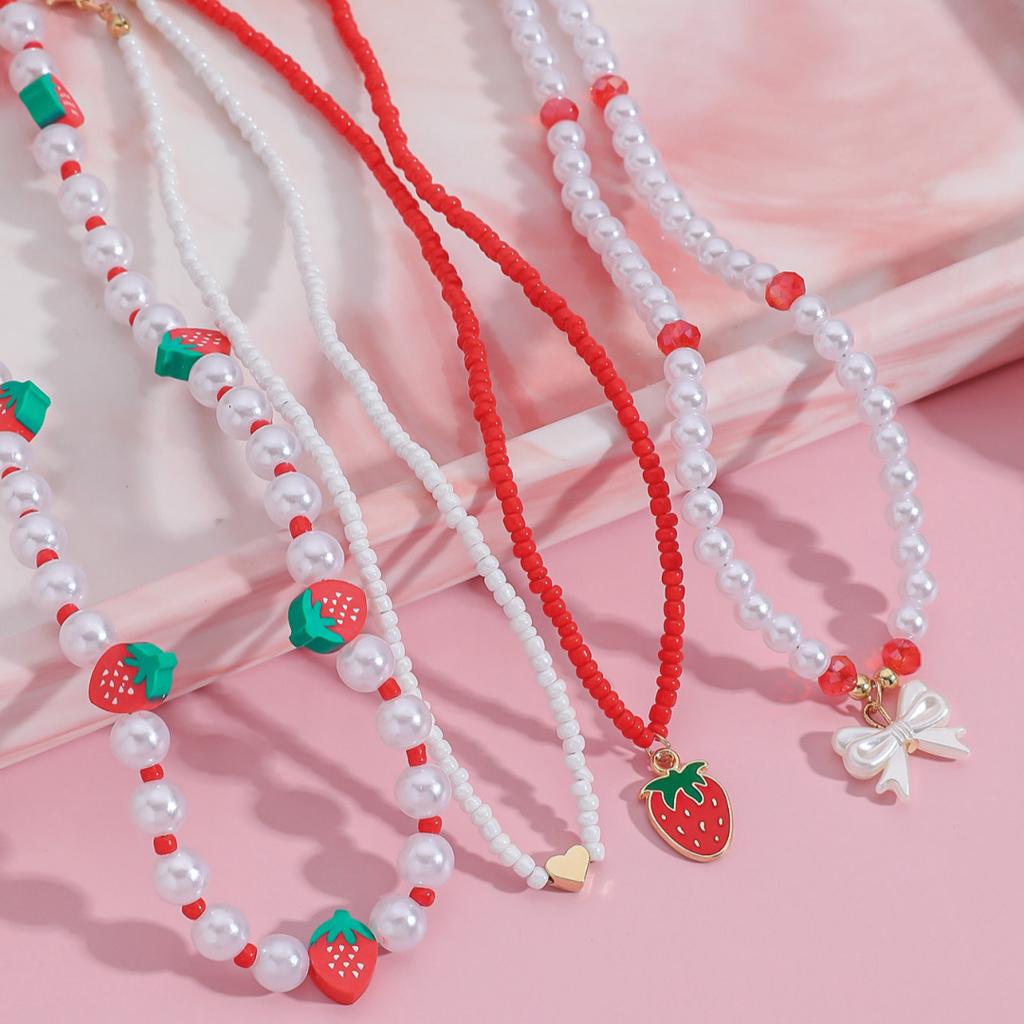 European and American idyllic style sweet and cute soft pottery strawberry bow love stacking necklace contrasting color imitation pearl necklace women
