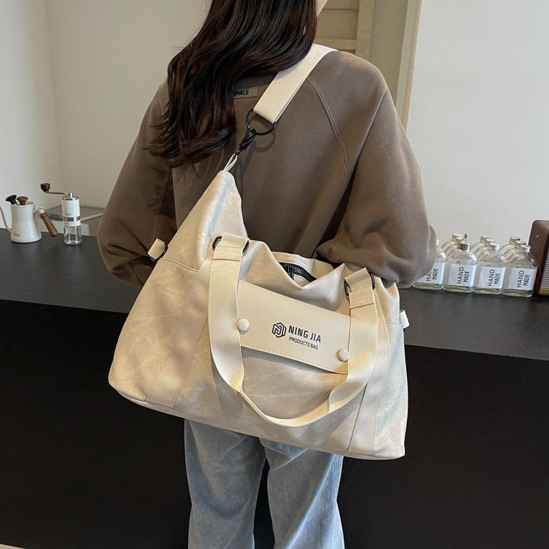 Fashion, fresh, foreign style, European and American style, multi-pocket travel bag, wet and dry separation sports fitness bag can be set with tie rod