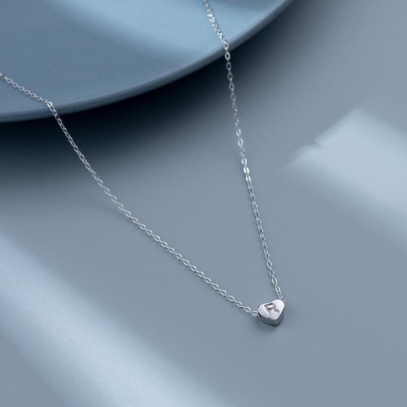 S925 Silver Heart-Shaped Initial Necklace - Korean Style Clavicle Chain with Trendy Peach Heart Design.