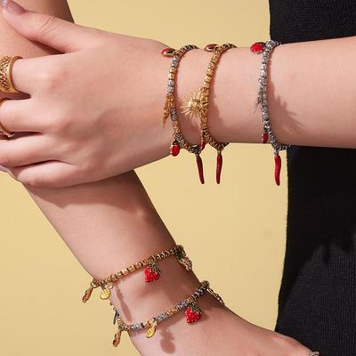 Qiong Yao 18k Gold-Plated Stainless Steel Bracelet with Small Pepper Beads & Multi-Accessories.