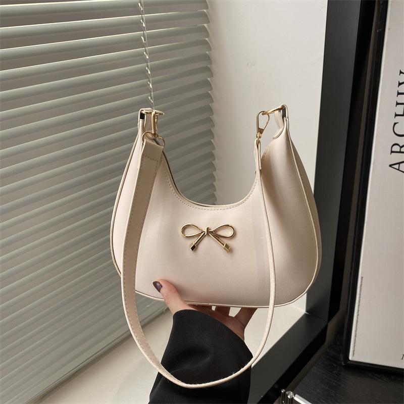 New Temperament Women's Bag Shoulder Bag Bow Decorative Design Crescent Bag Simple Niche Women's Bag