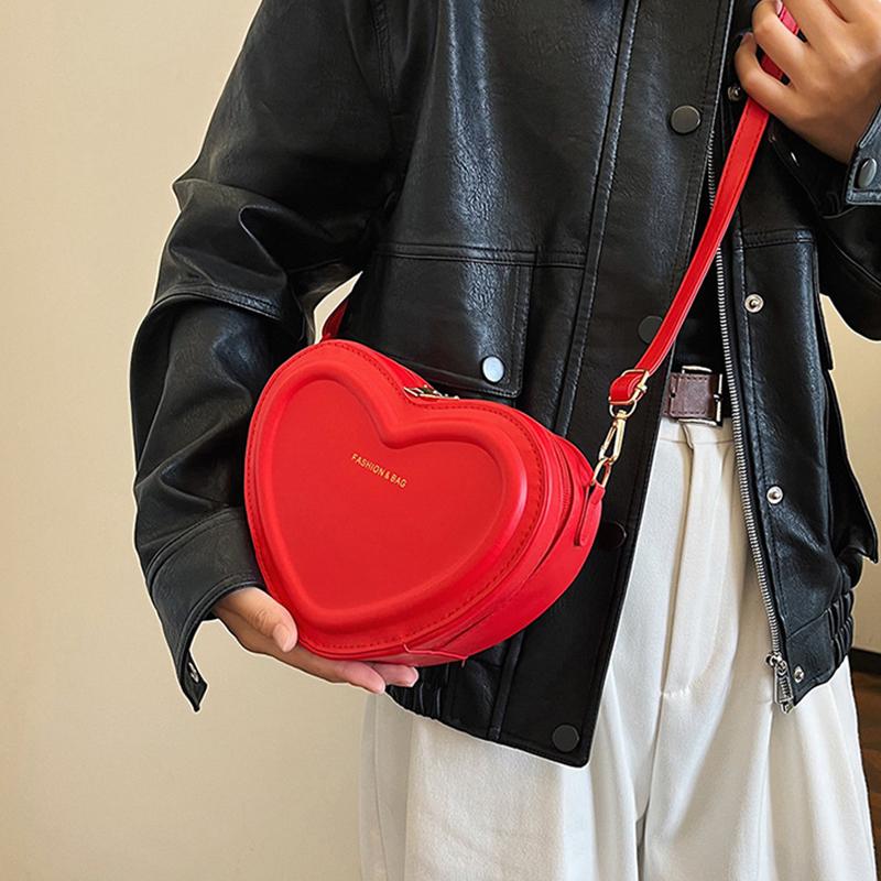 Modische Umhängetaschen in Herzform für Damen Neue einfarbige PU-Leder-Umhängetasche Lässige Damen-Handtaschen Designer-Taschen Qualität