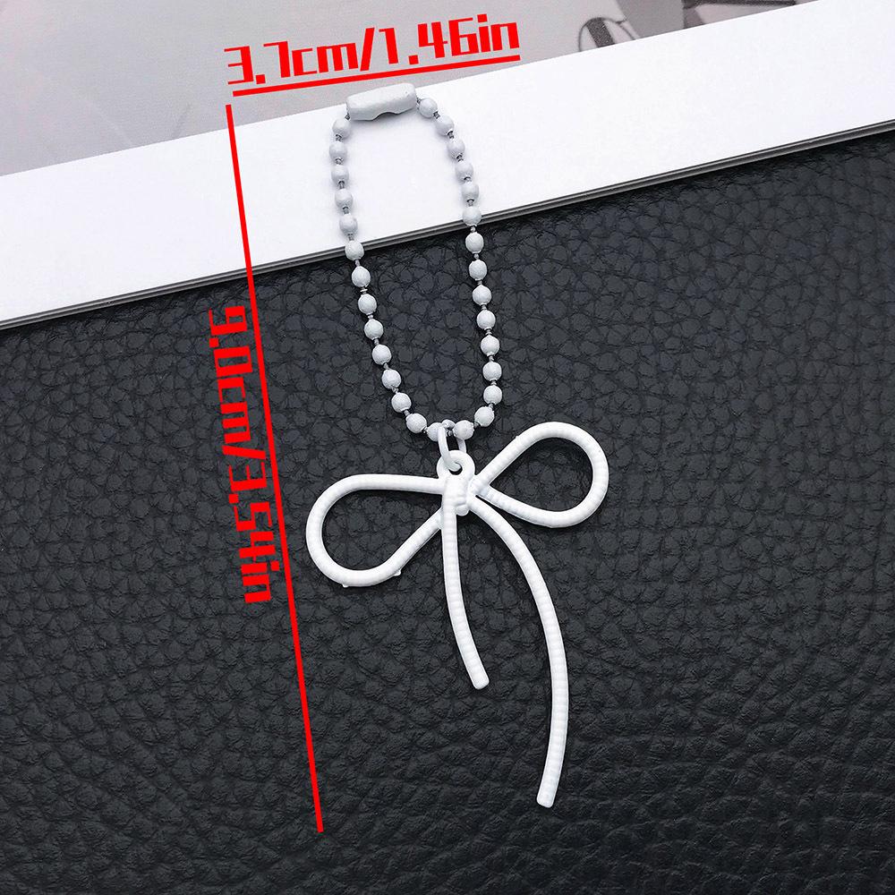 

Alloy Spray Paint Colored Ribbon Bow Pearl Chain Cup Hanger Phone Case Backpack Pendant