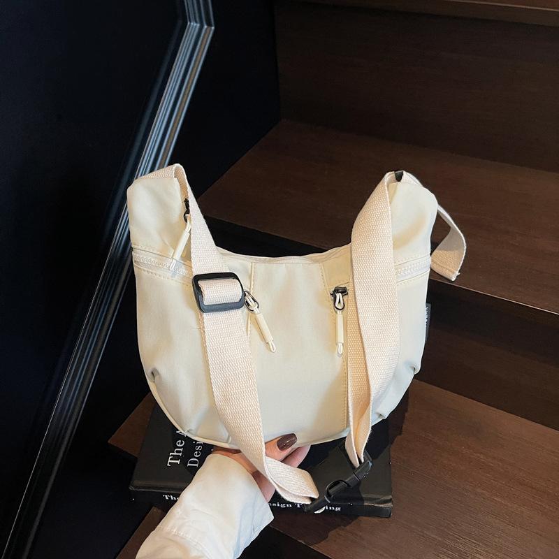 Premium Waterproof Messenger Bag Women's Fashion Sports Shoulder Bag Large Capacity Messenger Commuter Dumpling Bag