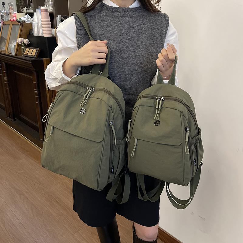 Schoolbag1011 New Backpack Women's High Sense Korean Version Niche Nylon Canvas To Work Commuter Travel Small Backpack