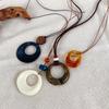 "Ethnic-Style Black Rope Ring Pendant Necklace - New Chinese Design for Autumn & Winter"
