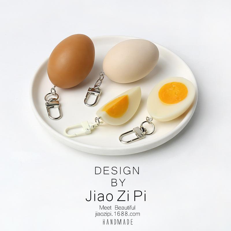 

Оригинальный брелок в виде половинки яйца: Креативный кулон и аксессуар для сумки Yellow Egg Keychain