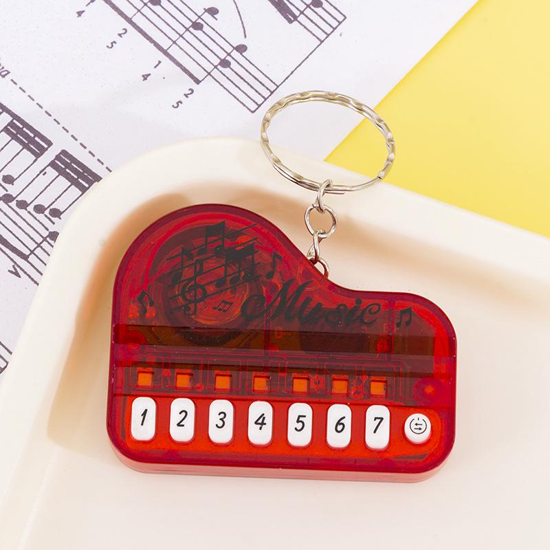 Mini Handheld Luminous Electronic Piano Keychain for Kids
