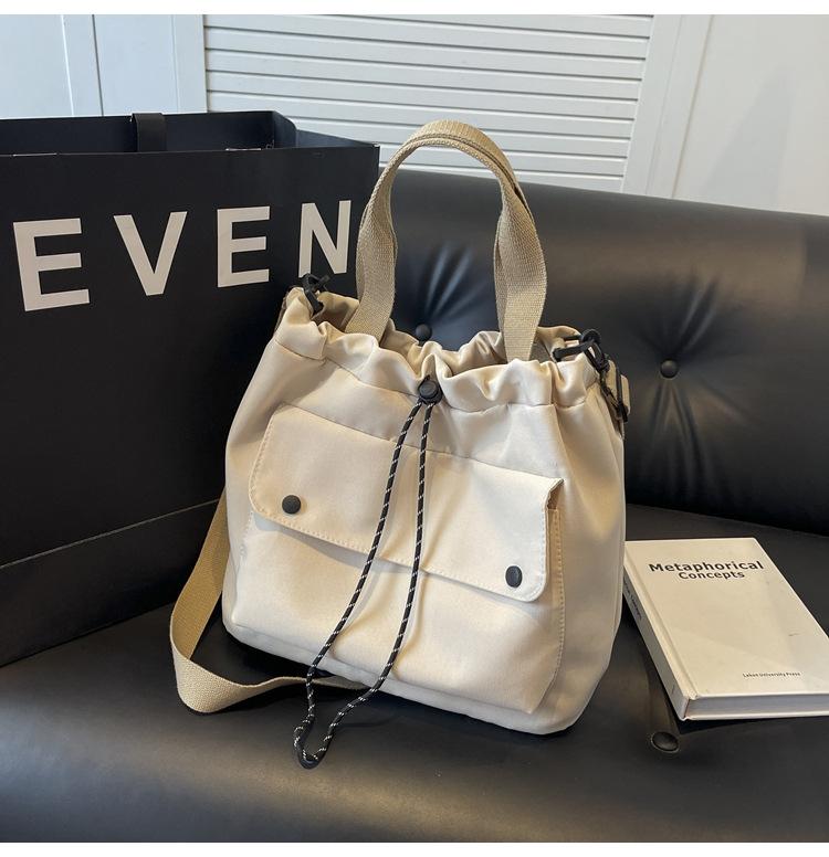 

2025 new Japanese literary bag Mori drawstring cloth bag shoulder crossbody fashion shopping bag popular commuter bag 32*15*28