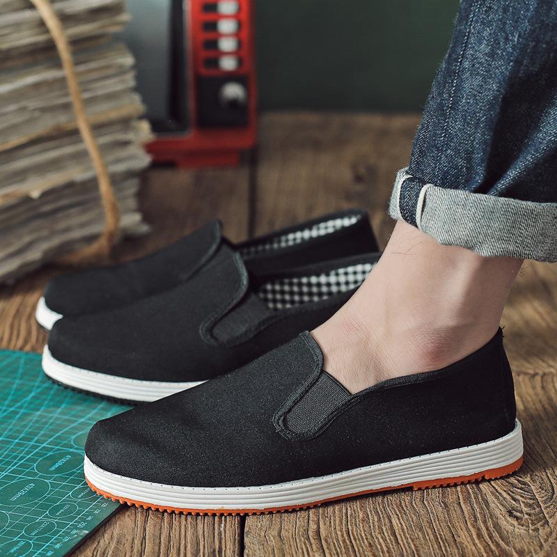 Casual and Breathable Cloth Shoes, A Woman Wearing Work Shoes on One Foot