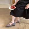 Mori women's woven hollow flat-bottomed bag head sandals women's summer new bohemian one-word strap Roman shoes genuine leather