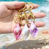 Red Plated Cartoon Conch Keychain Pendant - Small, Exquisite Gift for Couples and Car Keys