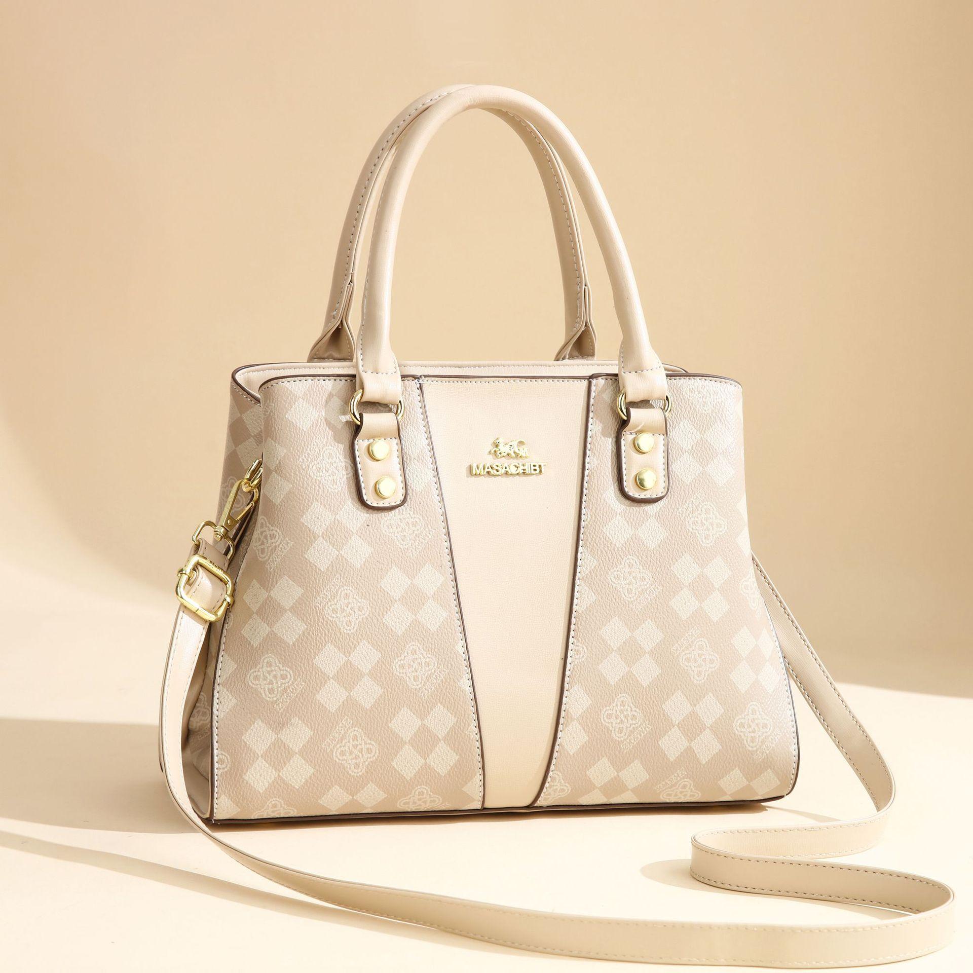 

Женская сумка из ПУ портативная 2025 нишевая женская сумка большая вместимость на плечо сумка-мессенджер с высоким чувством сумка-тоут женская