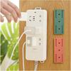 Power strip holder household socket plug-in board holder removable non-punching wall paste finishing device
