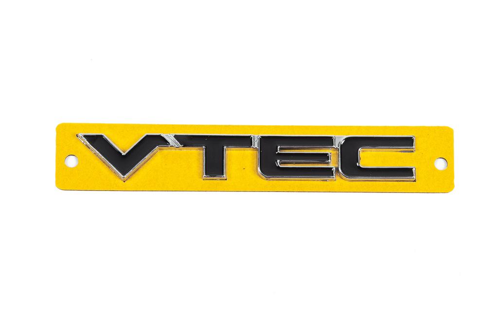 

Надпись VTEC черный с хромом (110мм на 15мм)