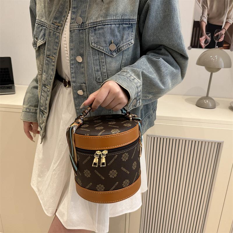 Beliebte Tasche Damen 2025 neue Mode tragbar ausgehen zur Arbeit beliebte kleine Zylindertasche Kosmetiktasche
