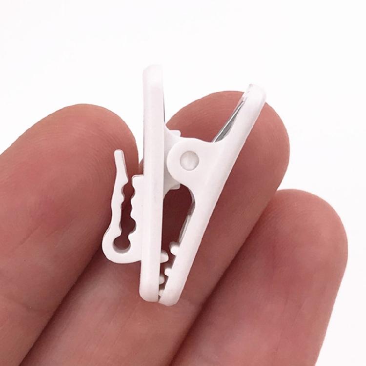 Spring Grip Thin Cord Fasteners with Separate Routing Guides for Earphone Cable Management Across Several Locations