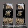 Funkelnde Leopardenmuster-Buchstaben-M-Glas-Handyhülle geeignet für Samsung Galaxy S26 S25 S24 S22 S21 S20 FE Ultra Plus sturzsicher