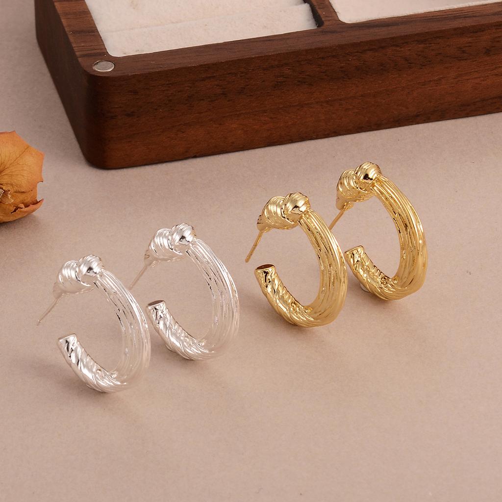 European and American cold wind knotted round earrings 925 retro design temperament stud earrings niche high-end earrings