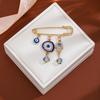 High-End Blue Rhinestone Tassel Pin: European & American Devil's Eye Sweater Brooch