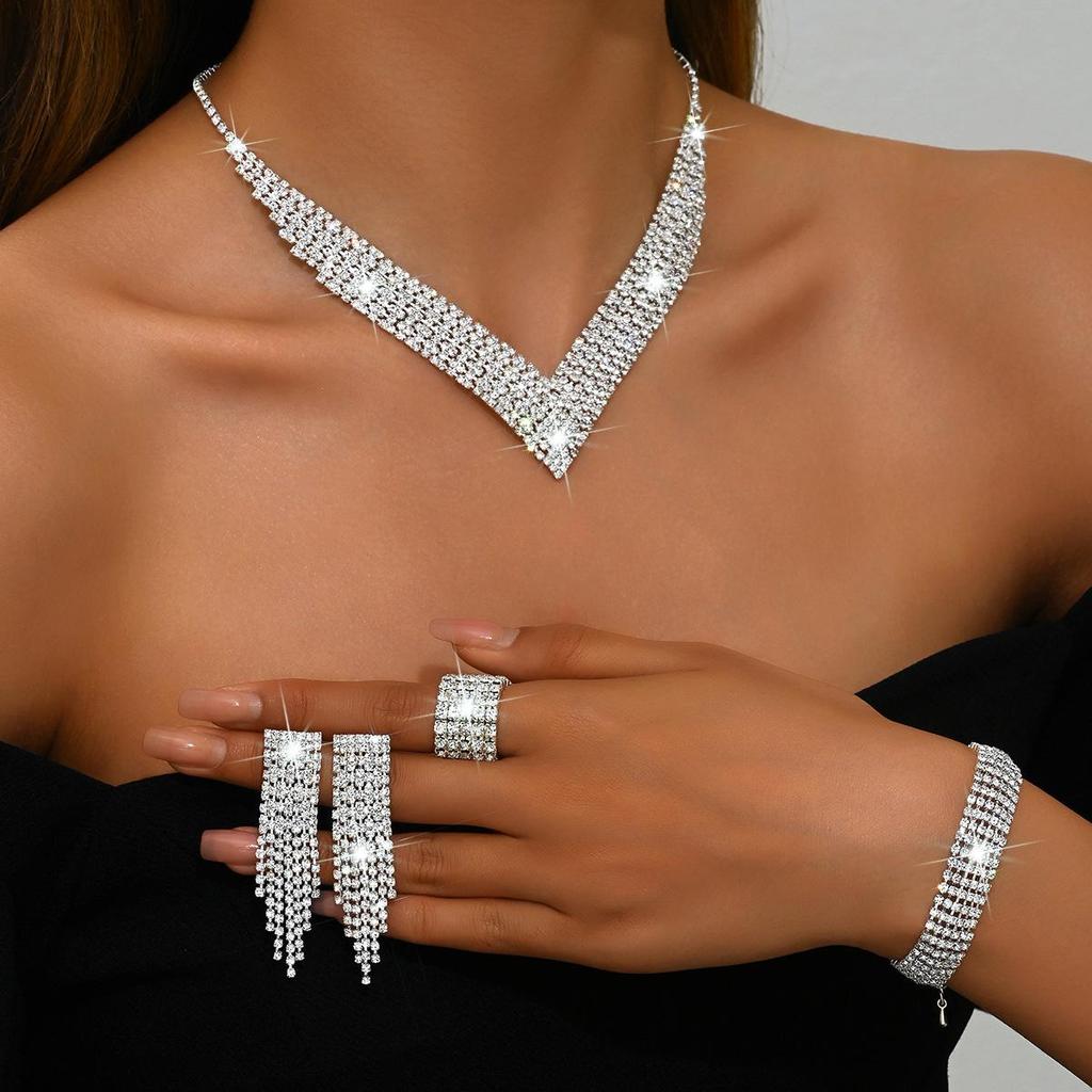 Luxury Diamond Jewelry Set: Shimmering Necklace, Tassel Earrings, Bracelet, and Ring for Brides