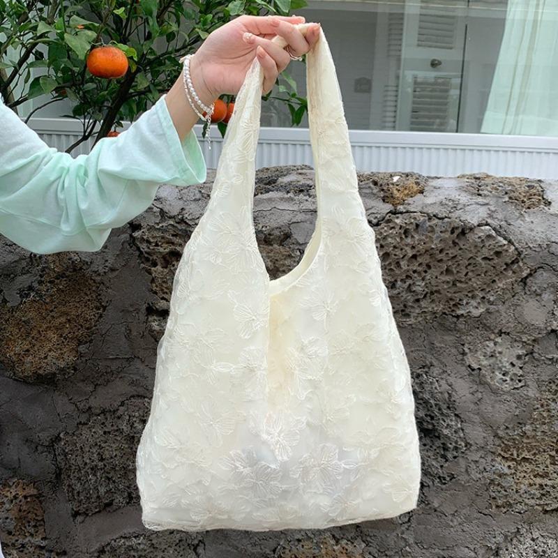 Eine frische und sanfte Stil-Schultertasche und Tragetasche aus Spitze