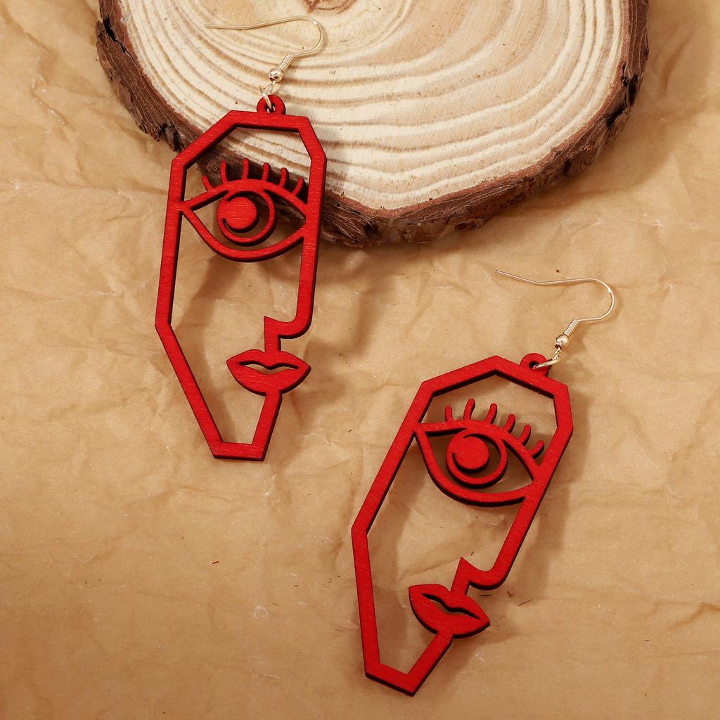 Creative and fashionable design earrings for the face: Abstract wood-cut, fashionable, niche, versatile and novel style