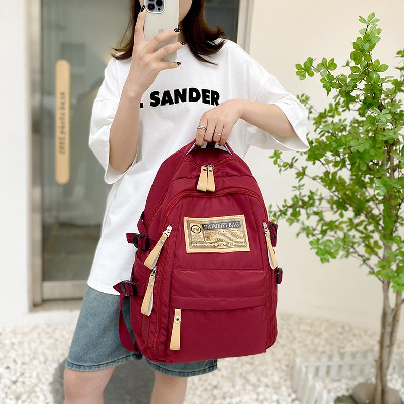 New backpack, junior high school, high school student schoolbag, large capacity backpack, lightweight retro trendy commuter backpack