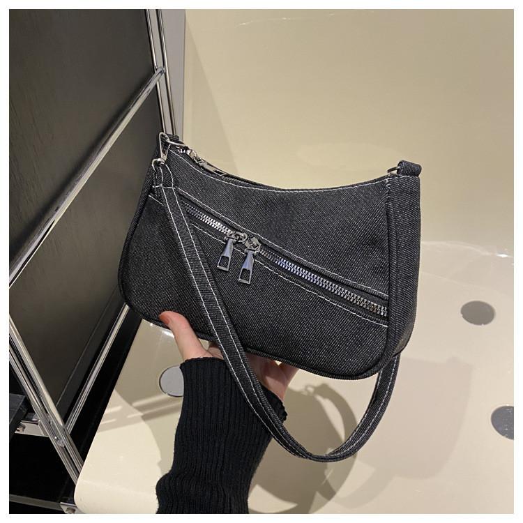 Neue Streetstyle-Umhängetasche aus Canvas für Damen (2024): Modisches Design mit schickem Achselbereich, trendig und vielseitig.