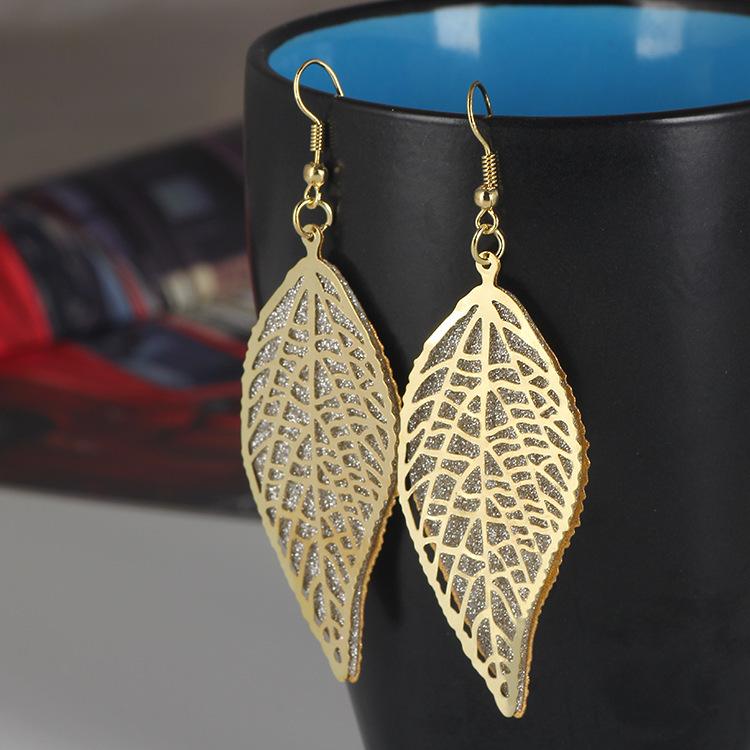 Frosted Geometric Leaf Tassel Earrings - Creative Hollow Round Design