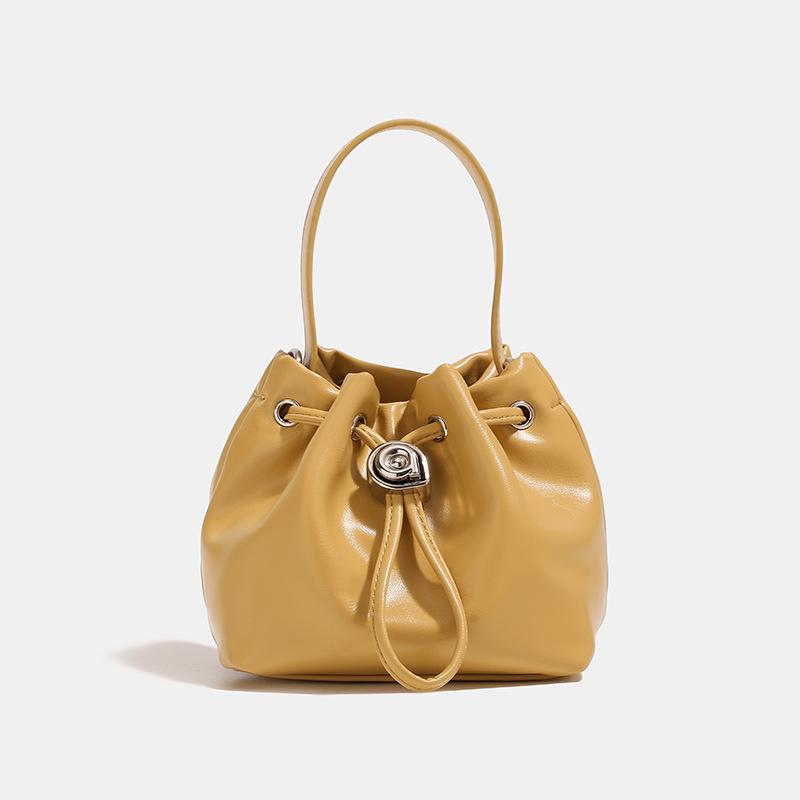 2024 Summer New Niche High-End Handheld Bucket Bag, Fashionable and Versatile Silver Drawstring Shoulder and Crossbody Bag for Women