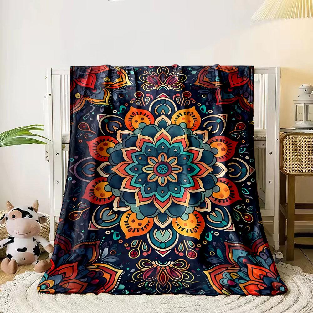 

A vibrant floral mandala pattern with intricate, symmetrical details. for all seasons blanket lunch break throw gift 80cm x 120cm