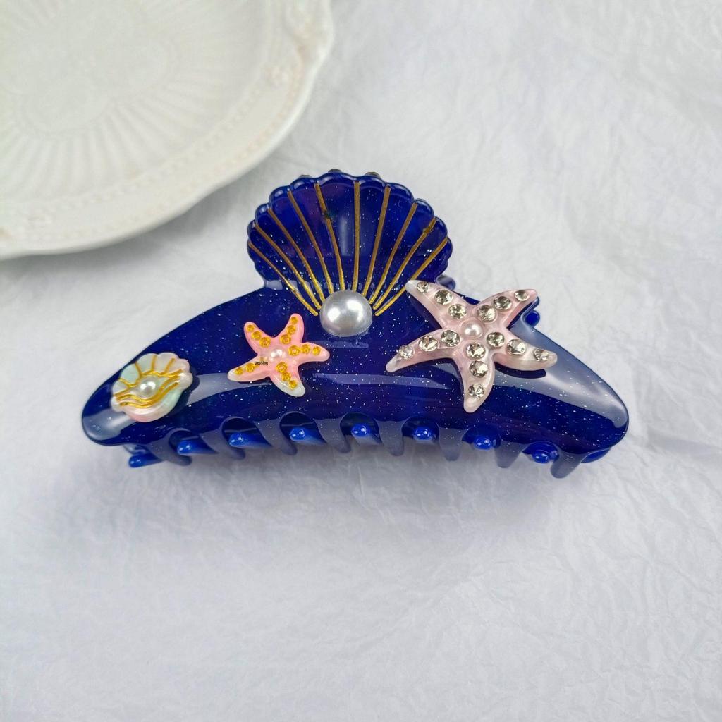 Elegancka spinka do włosów z cyrkoniami w kształcie rozgwiazdy i muszelkowa klamra do upięć