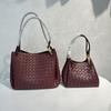 2025 New leather women's bag fashion classic woven bag butterfly buckle parachute shoulder oblique span bag