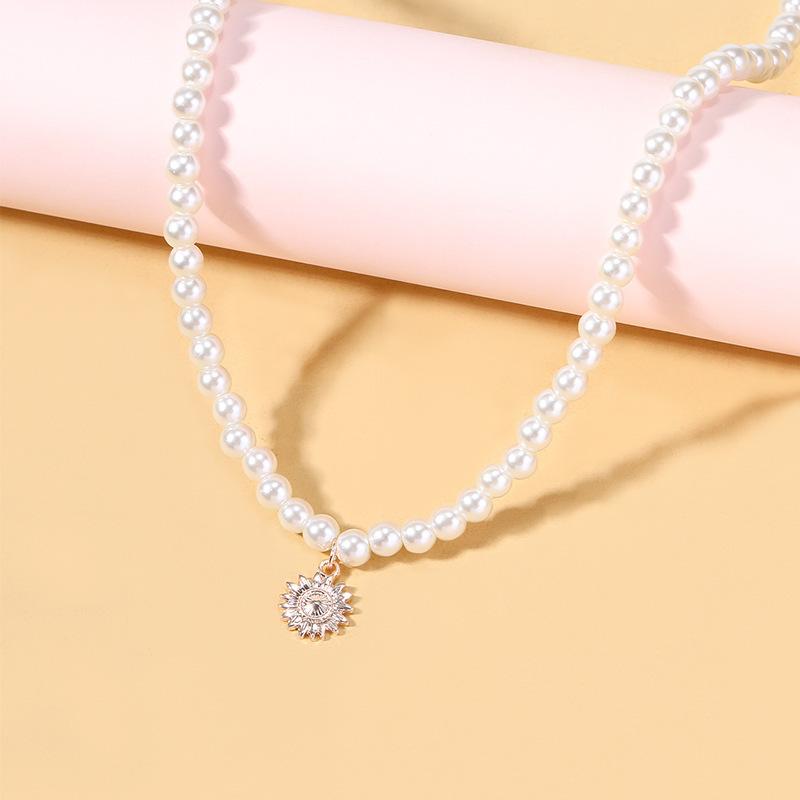 Pearl Neck Chain Wholesale European and American Pendant Jewelry Alloy Sun Niche Light Luxury High-end Sweater Necklace Women