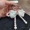 Mesh bow pearl bracelet women's ins fashion Xiaoxiangfeng mobile phone pendant mobile phone lanyard short wrist