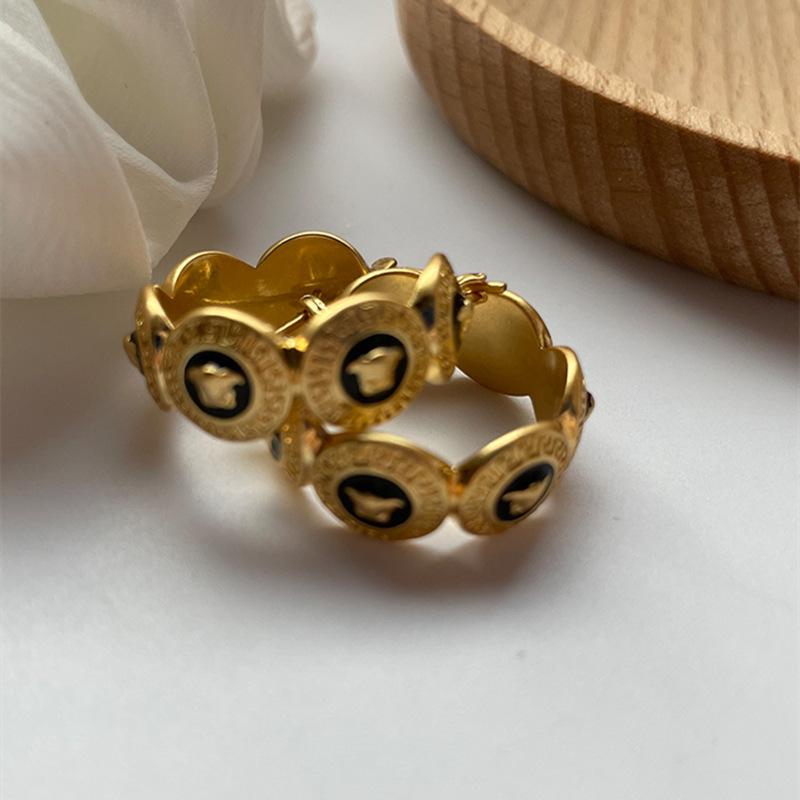 Modische und beliebte mittelalterliche und antike übergroße Ohrringe, personalisierter High-End-Sinn, schwarzer Öltropfen-Ohrschmuck