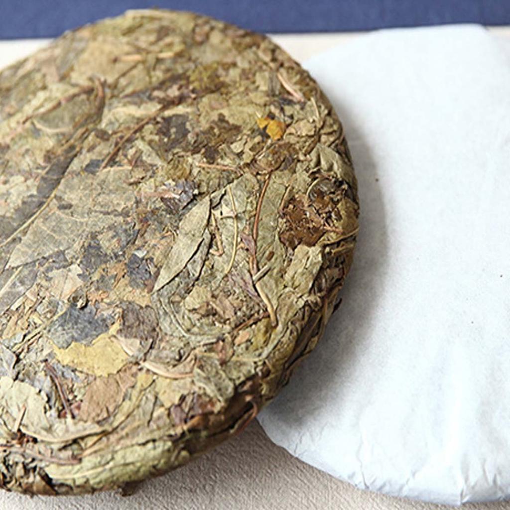 Yunnan Puerh Raw Tea Cake Ancient Tree Gold Leaf 357g