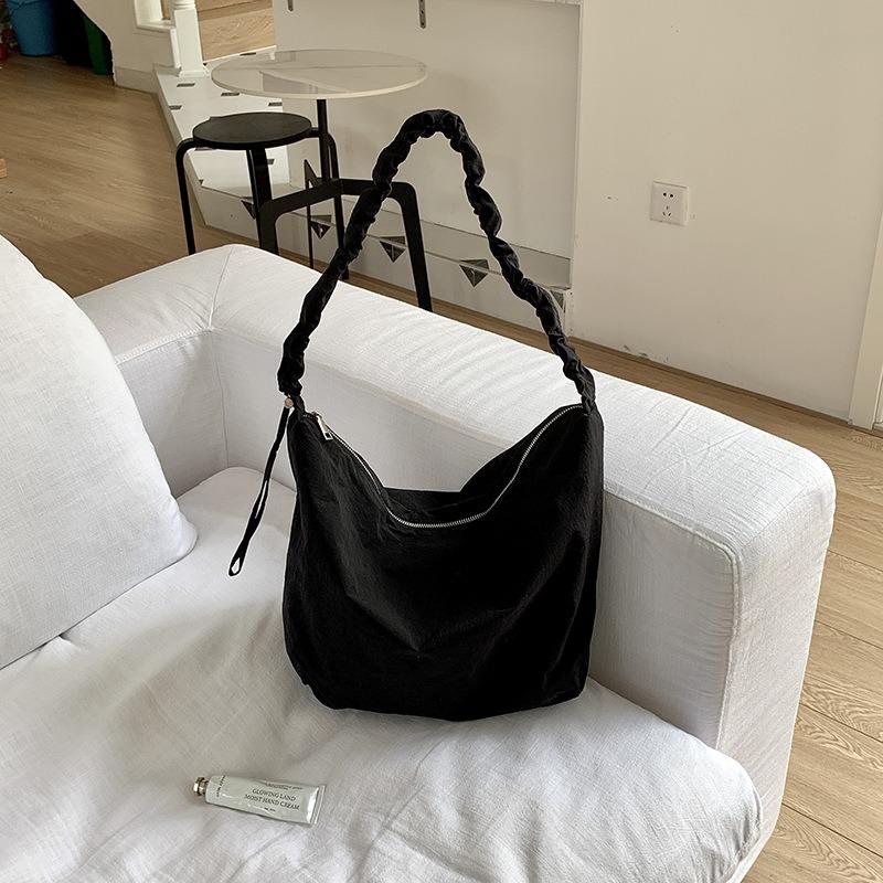 Shoulder bag women's senior sense spring and summer versatile commuter dumpling bag nylon drawstring pleated casual messenger bag women