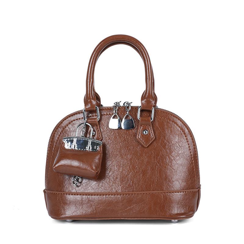 Fashion light luxury portable small bag women's 2025 new foreign style retro shell bag niche retro shoulder messenger bag