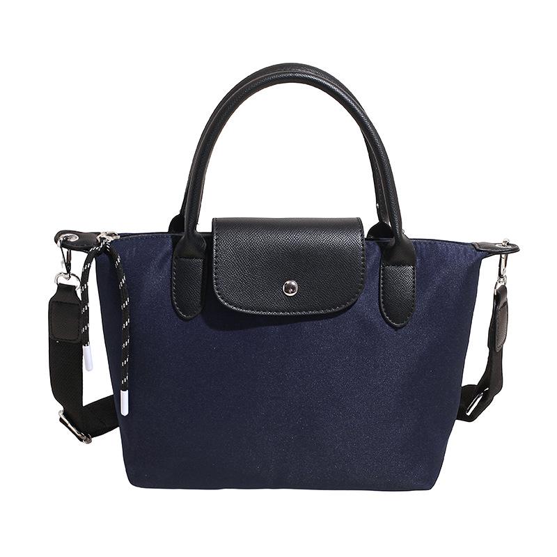 Minimalist Color-Block Oxford Cloth Handbag: Versatile, Fashionable Shoulder Bag with Unique Texture.