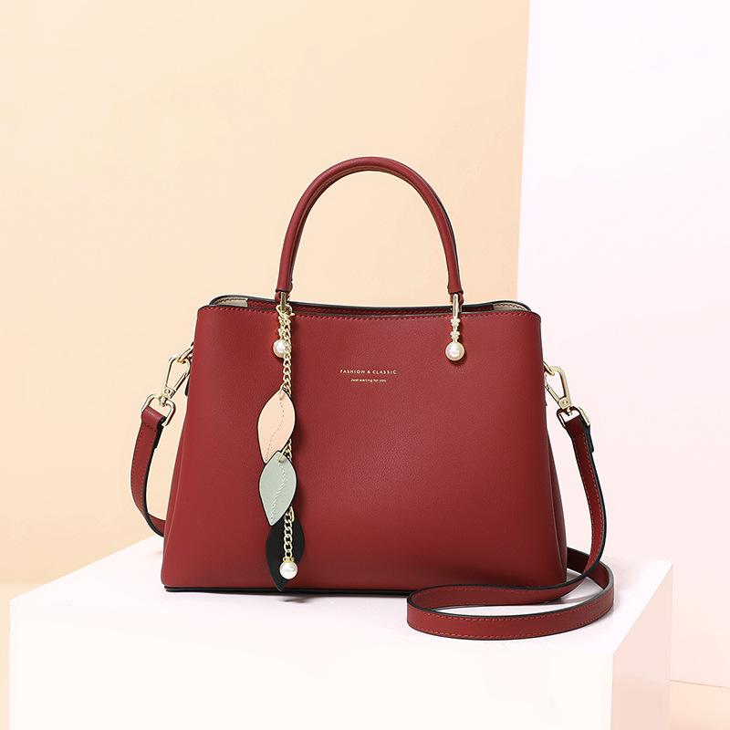 

2025 New Women s Handbag Versatile Large Capacity Shoulder Bag Fashionable High-end Crossbody Commuter Bag червоний
