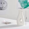 White Ceramic Vase with Dried Baby's Breath for Living Room or Dining Table Decoration