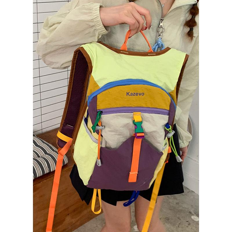 

Colorful splicing contrast casual bag women s 2025 new fashion nylon backpack large-capacity travel bag разноцветный