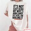 ITS NOT EASY BEING MY WIFES ARM CANDY BUT HERE LAM NAILING IT Shirt Funny Husband TShirt Wifes Arm Candy Design