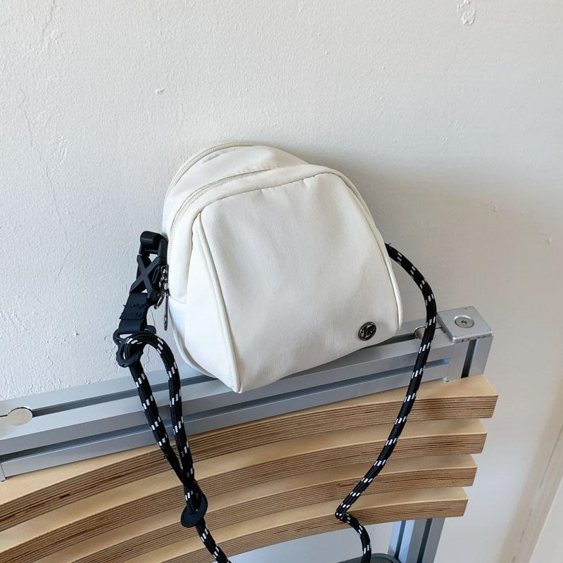 

Fashion sense small backpack women s lightweight casual shoulder bag new shell bag simple messenger bag