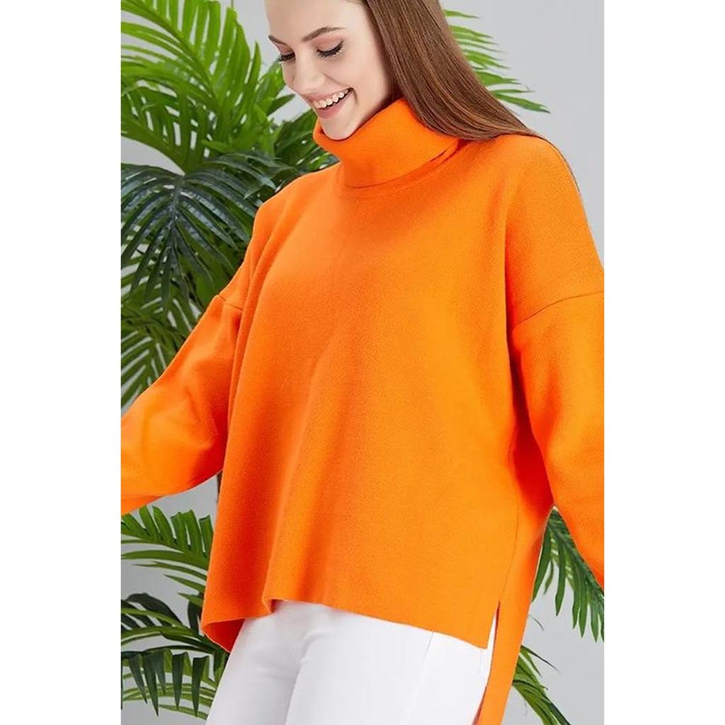 Tunique en tricot orange surdimensionnée à col roulé