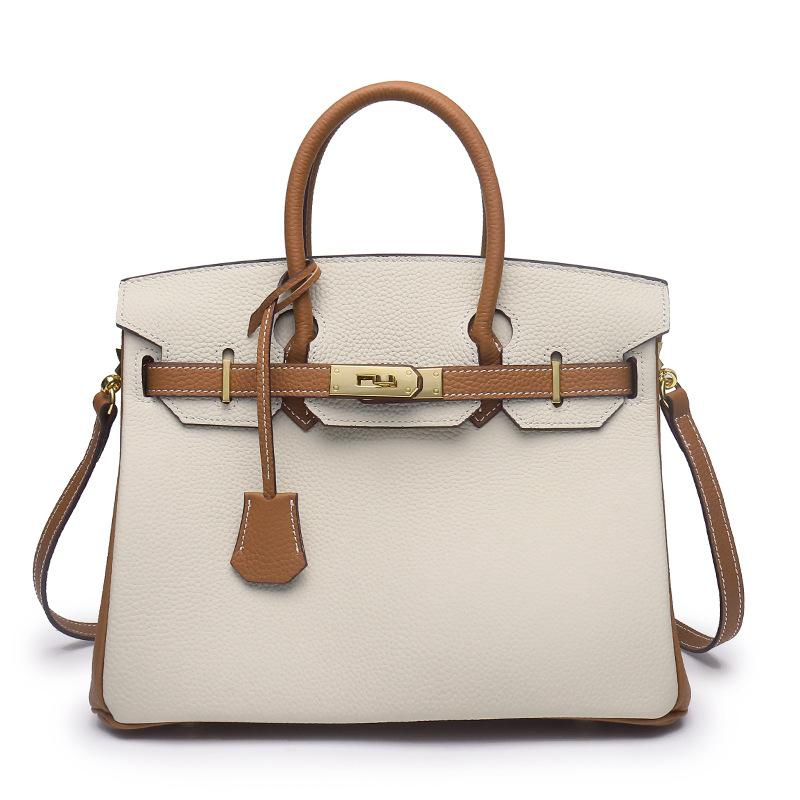 2021 Spring new trendy leather handbag top layer cowhide capacity one-shoulder crossbody hand-carried platinum bag