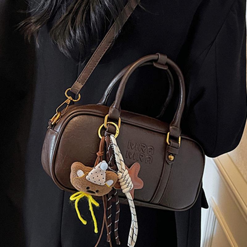 Niche retro portable pillow bag women's handbag 2025 autumn new fashionable high-value shoulder messenger bag