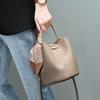 New first-layer cowhide bag, high-end niche design women's bag, spring and summer leather single shoulder crossbody bucket bag